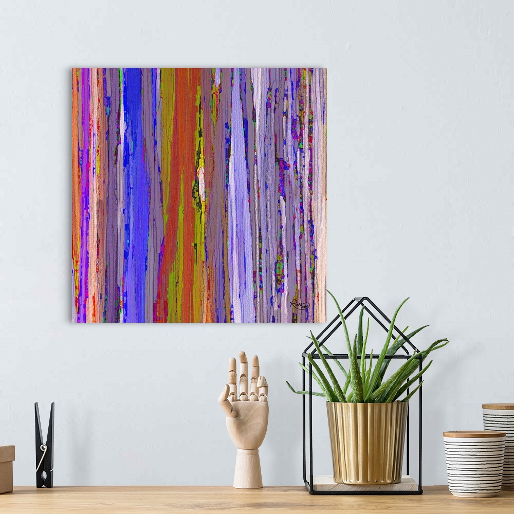 A bohemian room featuring Square abstract art with cracked, cool toned, vertical lines side by side.