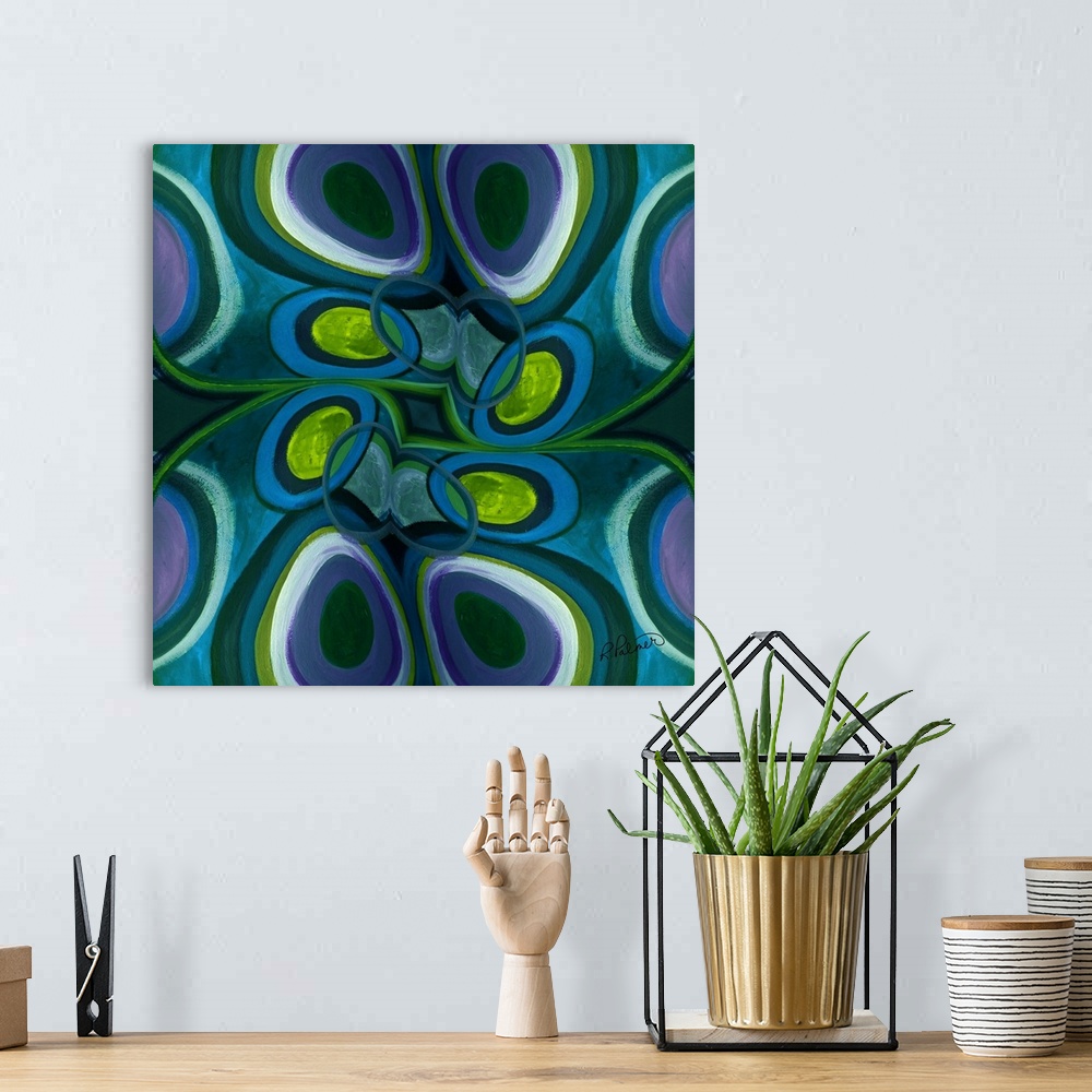 A bohemian room featuring Square abstract painting with circular style shapes in shades of blue, green and purple.