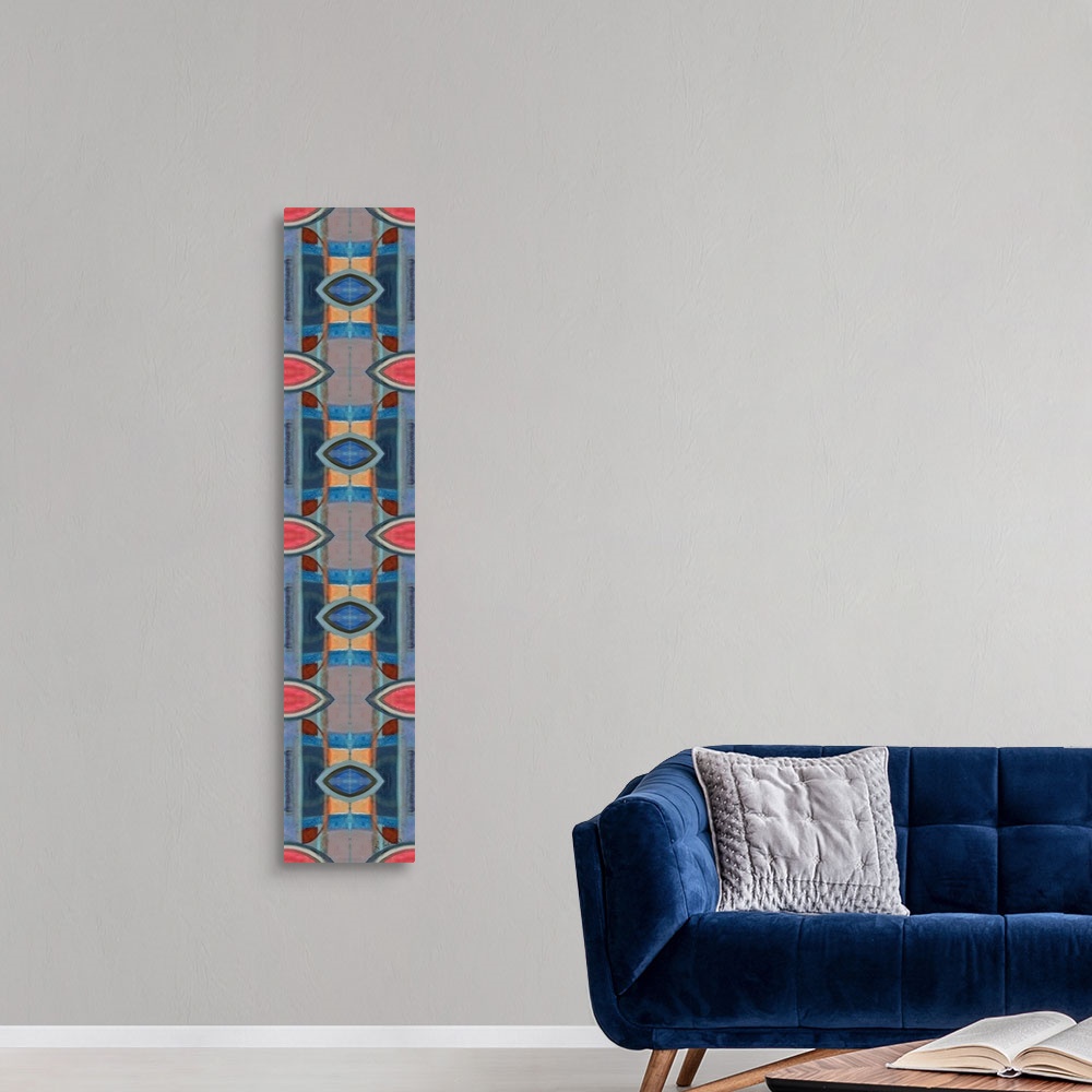 A modern room featuring Large symmetrical painting with oblong shaped designs in shades of blue, orange, and pink.