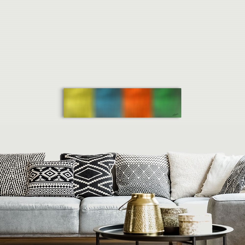 A bohemian room featuring A long horizontal design of blurred squared colors that faded into each other.