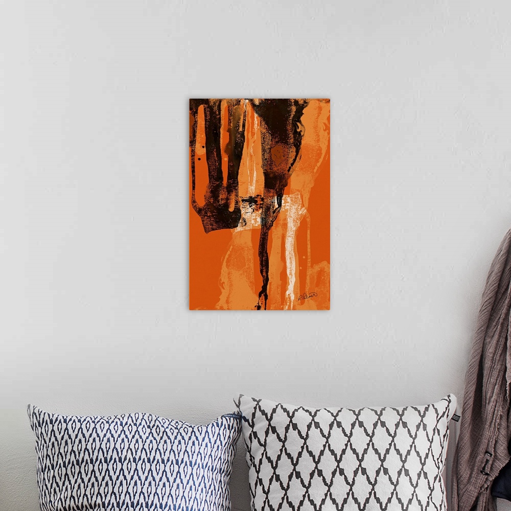 A bohemian room featuring Abstract painting with a bright orange background and black, white, and lighter orange brushstrok...