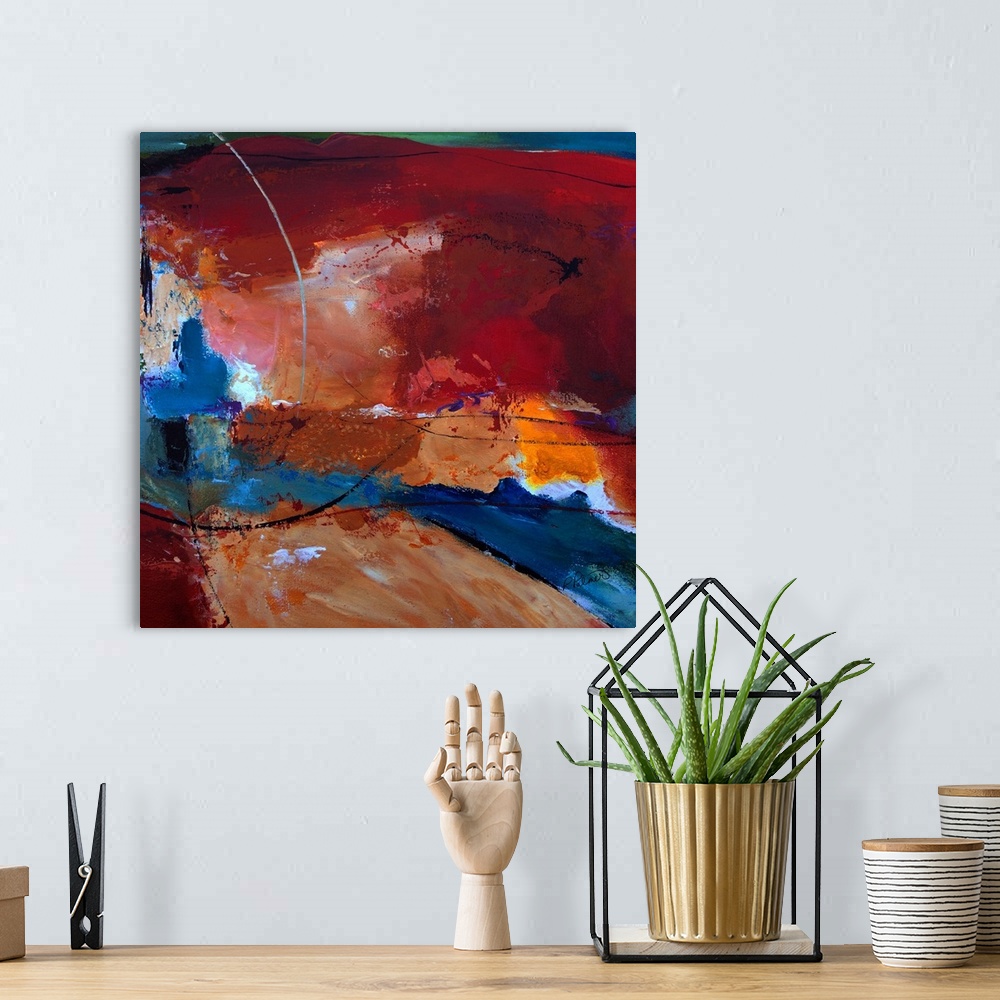 A bohemian room featuring Deep square abstract painting in shades of blue, red, orange, and brown with sporadic, thin, blac...