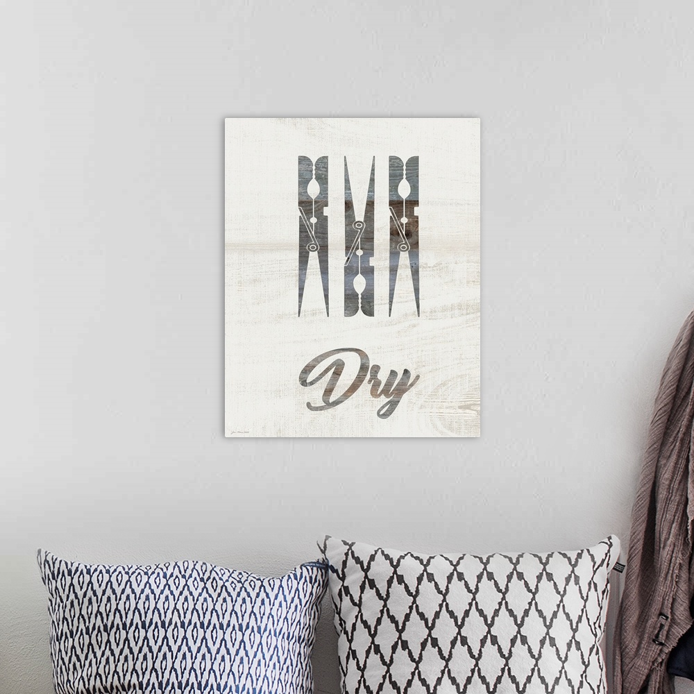 A bohemian room featuring Typographic laundry art on a shiplap wood background.