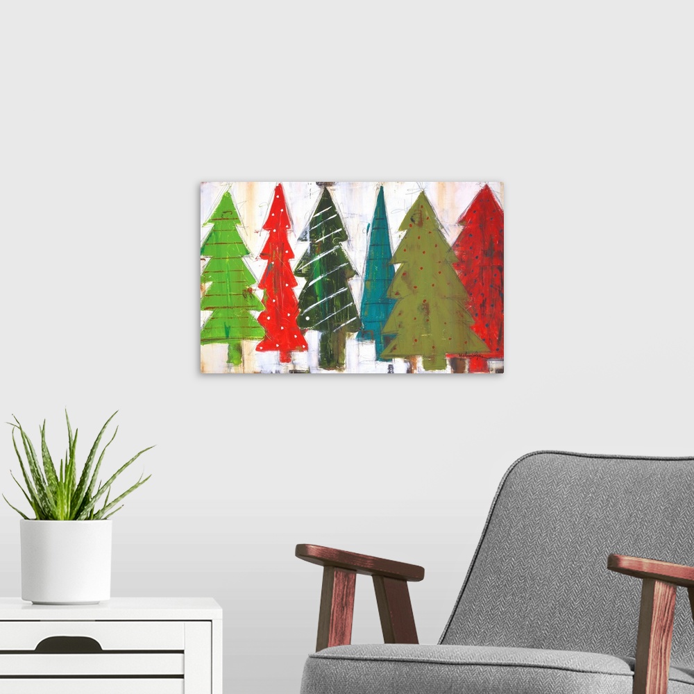 A modern room featuring Contemporary painting of different colored and patterned Christmas trees, against a gray background.