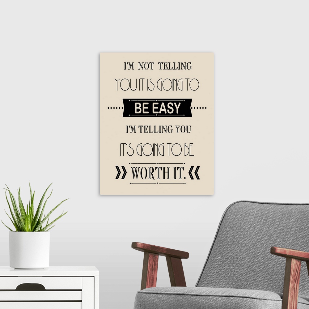 A modern room featuring Typographic inspirational artwork using black text against a cream toned background.