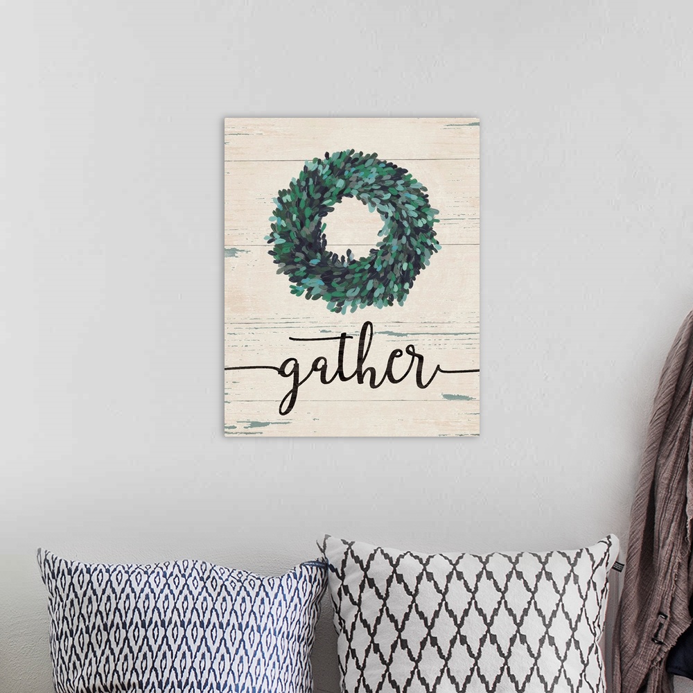 A bohemian room featuring Green Christmas wreath over the word "Gather" on a white barn wood background.