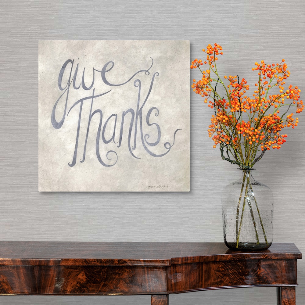 A traditional room featuring Handlettered Thanksgiving artwork in grey script on a neutral background.