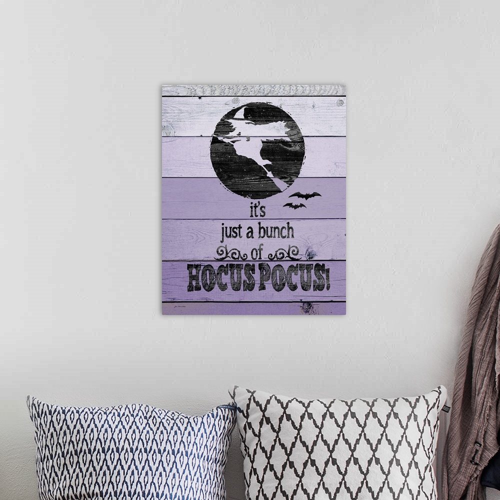 A bohemian room featuring Humorous Halloween typography art on a wooden board background.