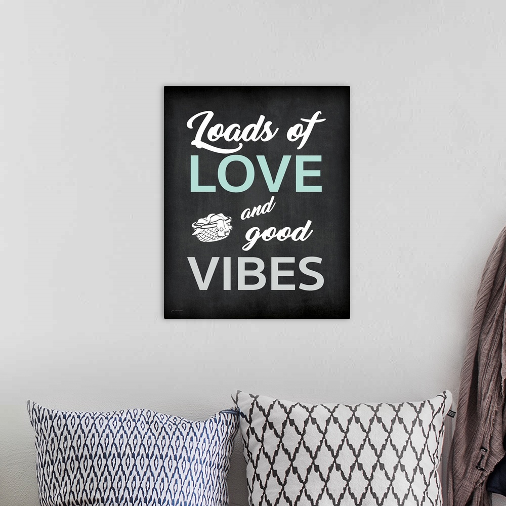 A bohemian room featuring Typographic laundry art on a chalkboard style background.