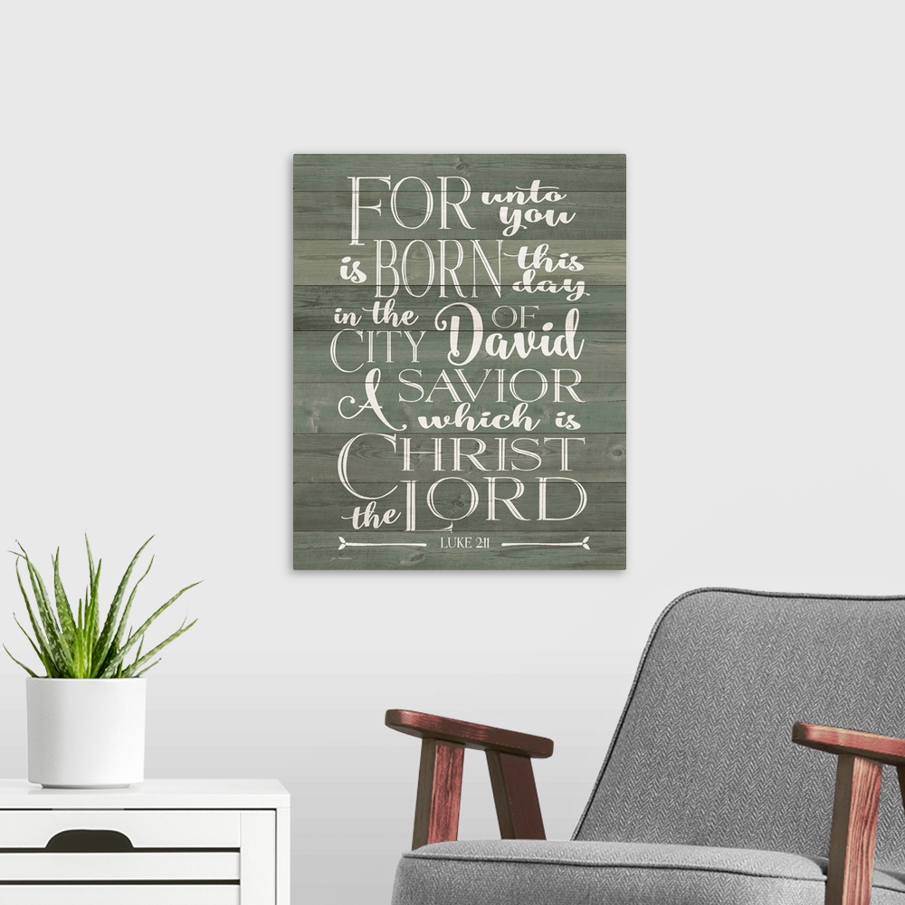 A modern room featuring Luke 2:11 on a wood paneled background