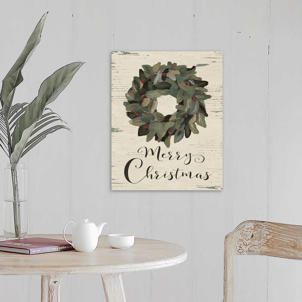 A farmhouse room featuring A decorative wreath with the phrase "Merry Christmas" painted on a wooden background.