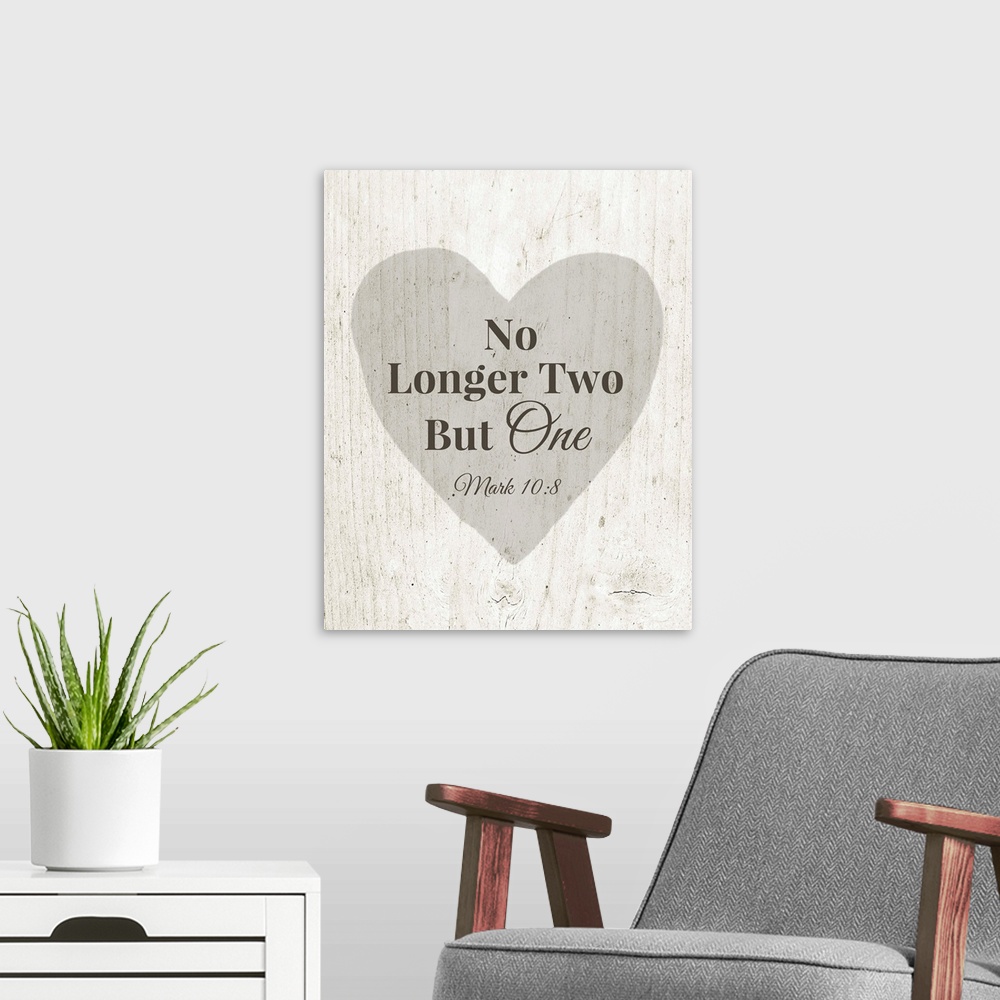 A modern room featuring Wedding themed typography art of Bible verse Mark 10:8, over a grey heart on white barnwood.
