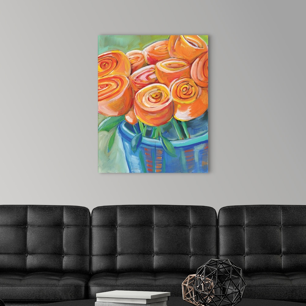 A modern room featuring Contemporary painting of a vase holding orange tulips.