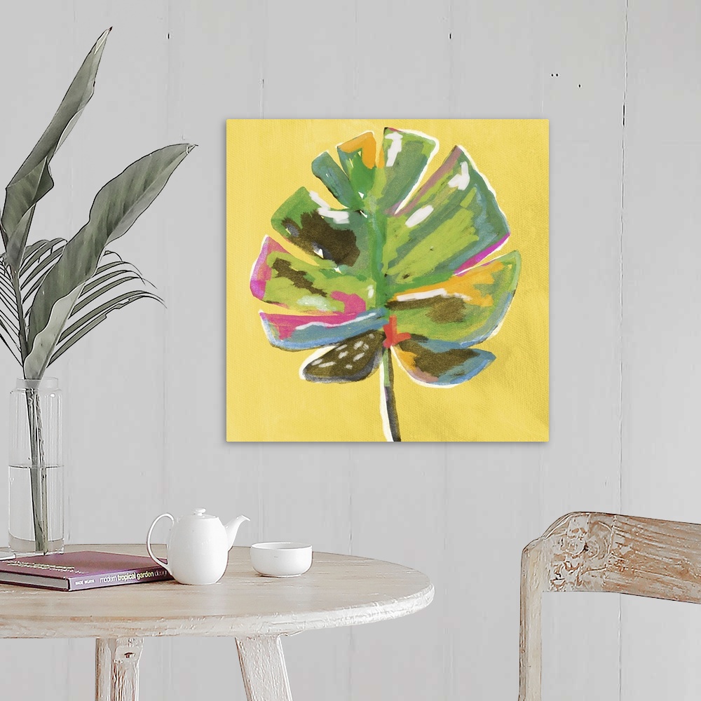 A farmhouse room featuring Square painting of a colorful palm leaf on a yellow background.