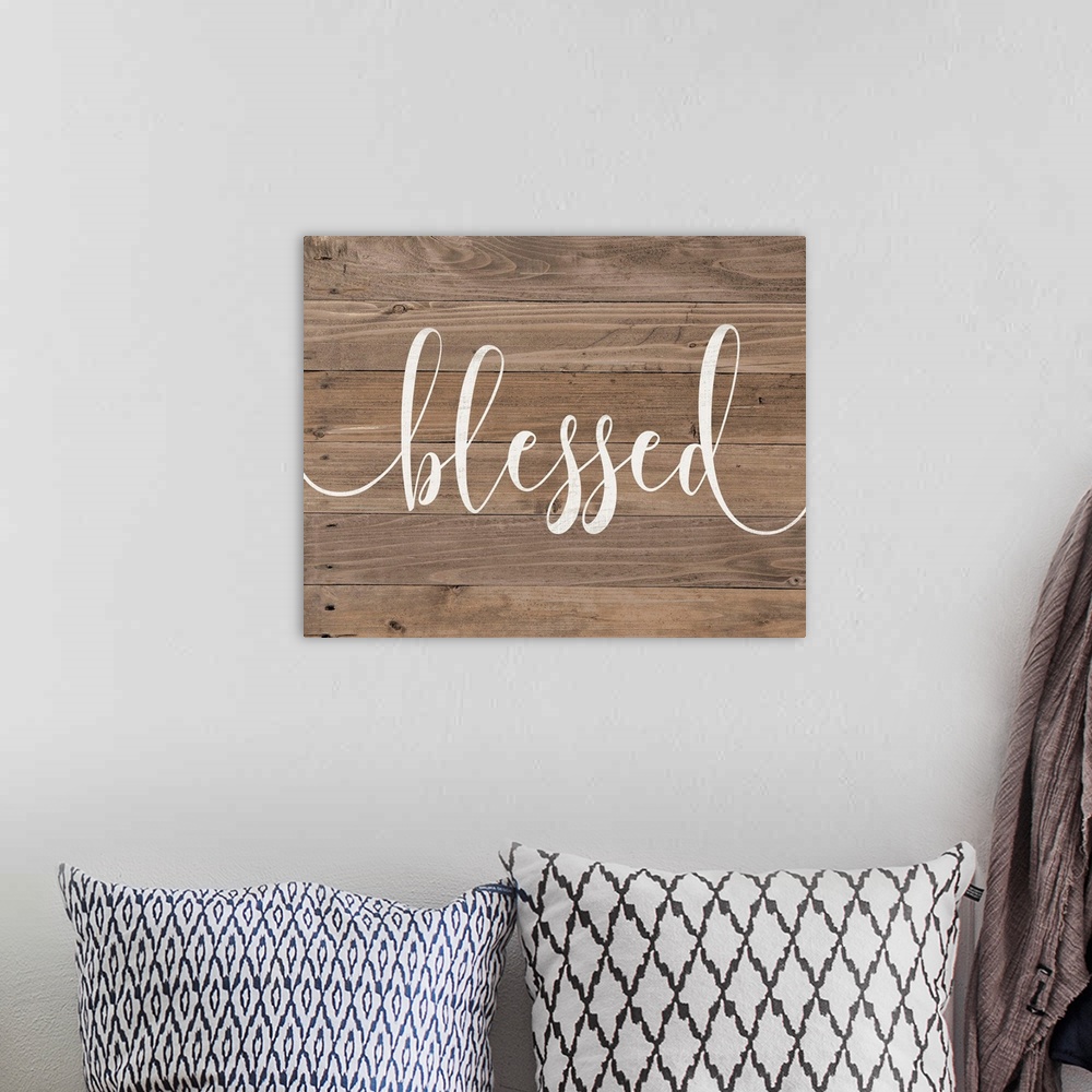 A bohemian room featuring Distressed typographic art with a shiplap wood background.
