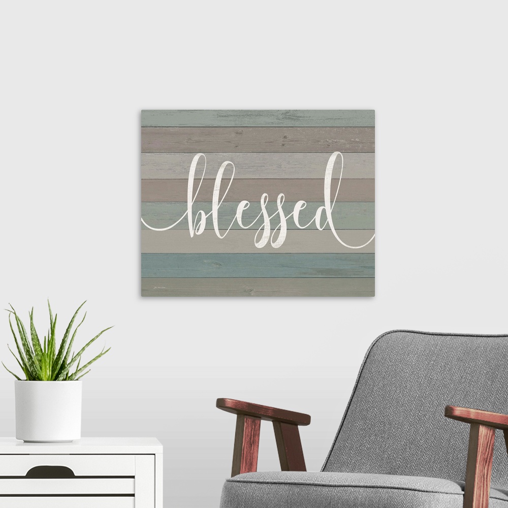 A modern room featuring "Blessed" against blue and gray shiplap wood background.