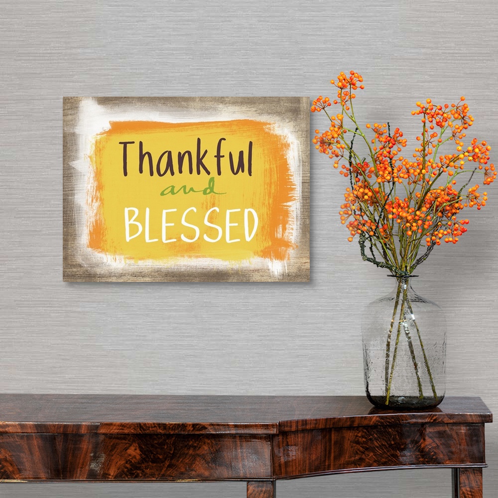 A traditional room featuring Thanksgiving typography artwork with a painted wooden board effect in yellow and orange.