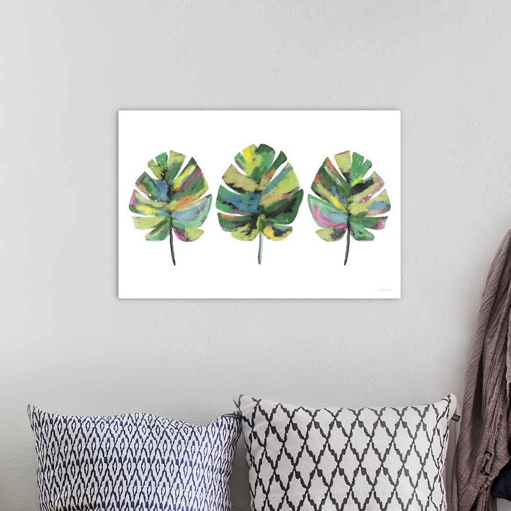 A bohemian room featuring Contemporary painting of three colorful palm leaves on a white background.