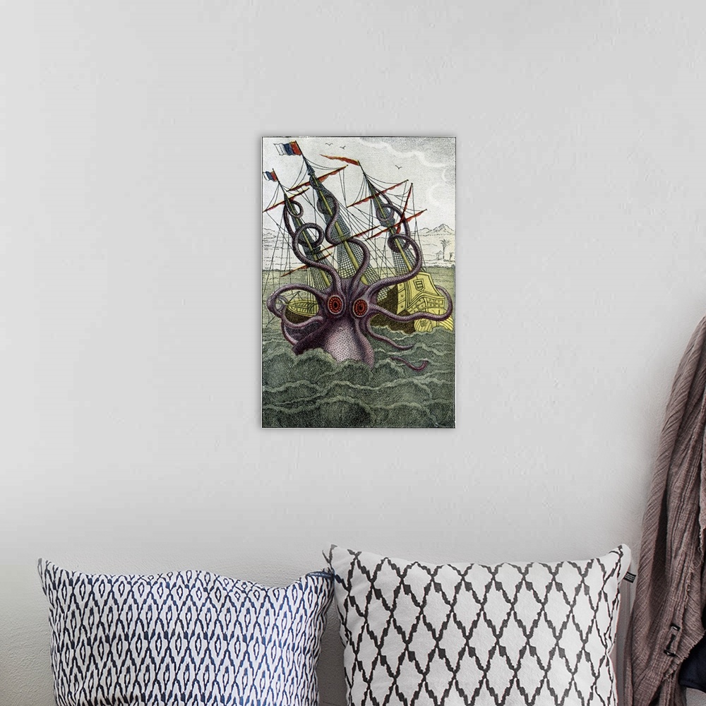 A bohemian room featuring 16th Century French engraving. Historical coloured print of a mythical giant squid (Kraken) attac...