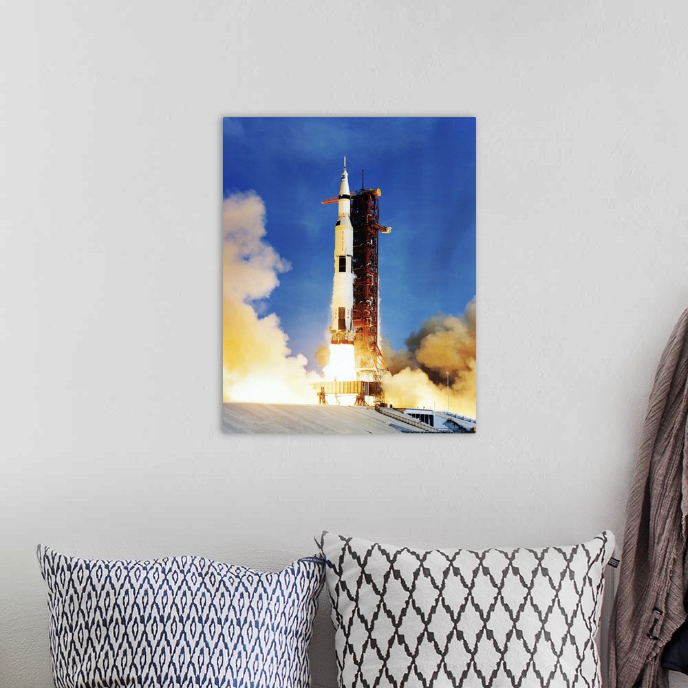 A bohemian room featuring Apollo 11 spacecraft launching on top of a Saturn V rocket from Kennedy Space Center, Florida, US...