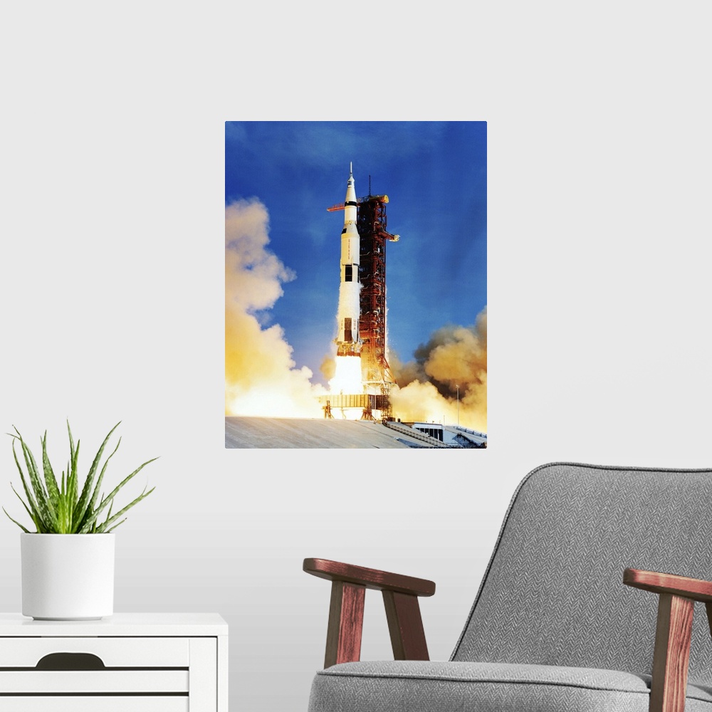 A modern room featuring Apollo 11 spacecraft launching on top of a Saturn V rocket from Kennedy Space Center, Florida, US...