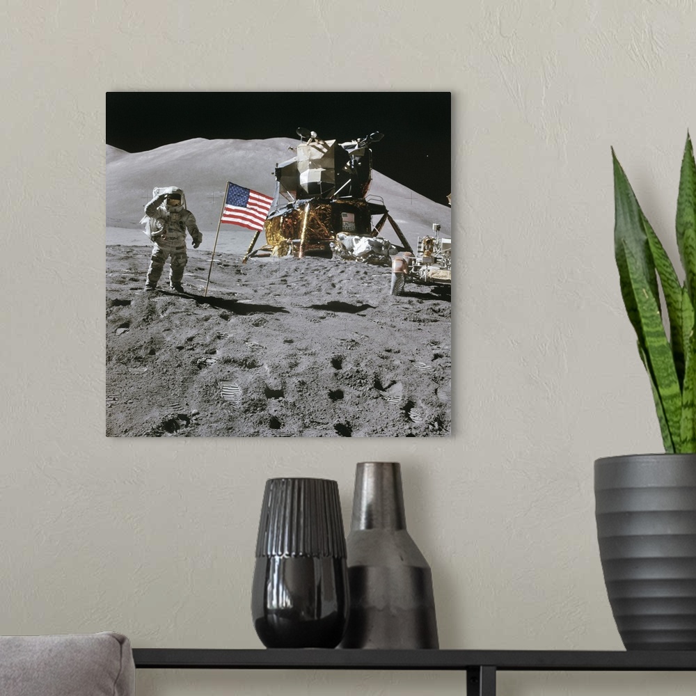 A modern room featuring Apollo 15 lunar surface exploration, August 1971. US astronaut James Irwin saluting next to the U...