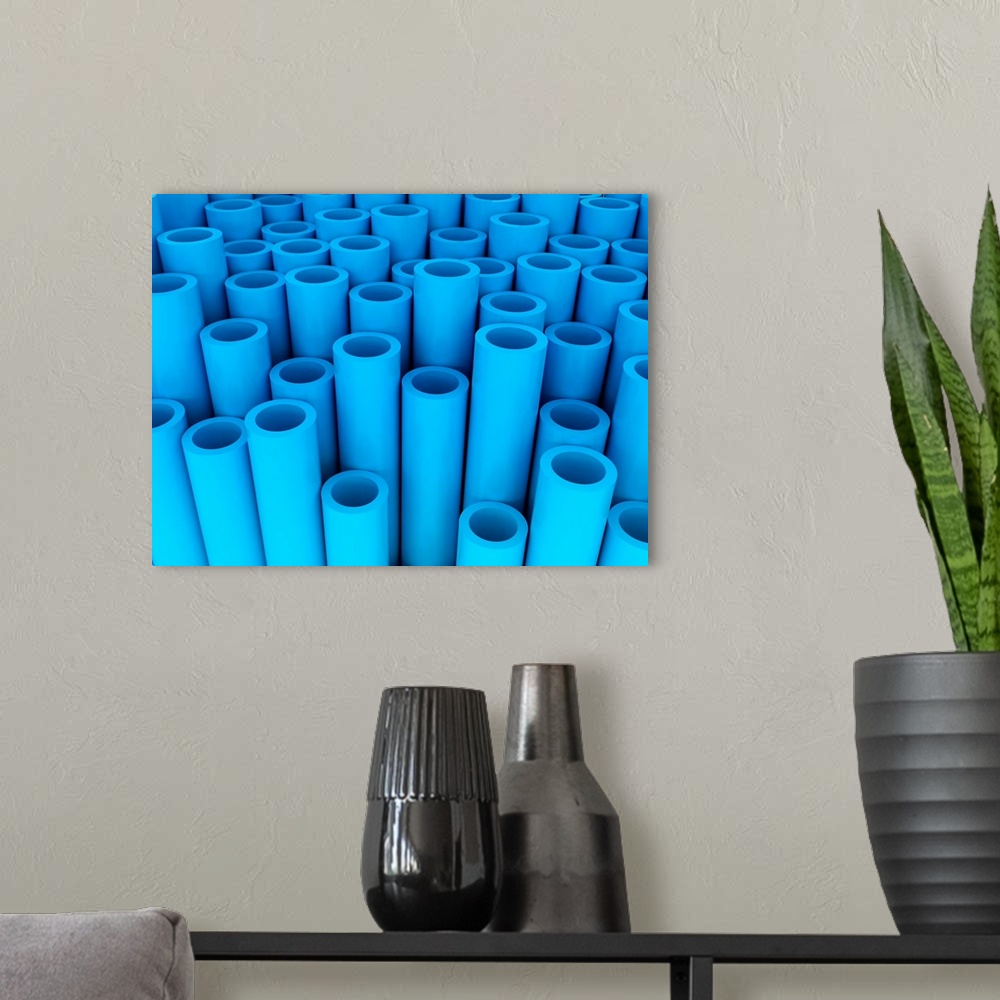 A modern room featuring Blue tubes, illustration.