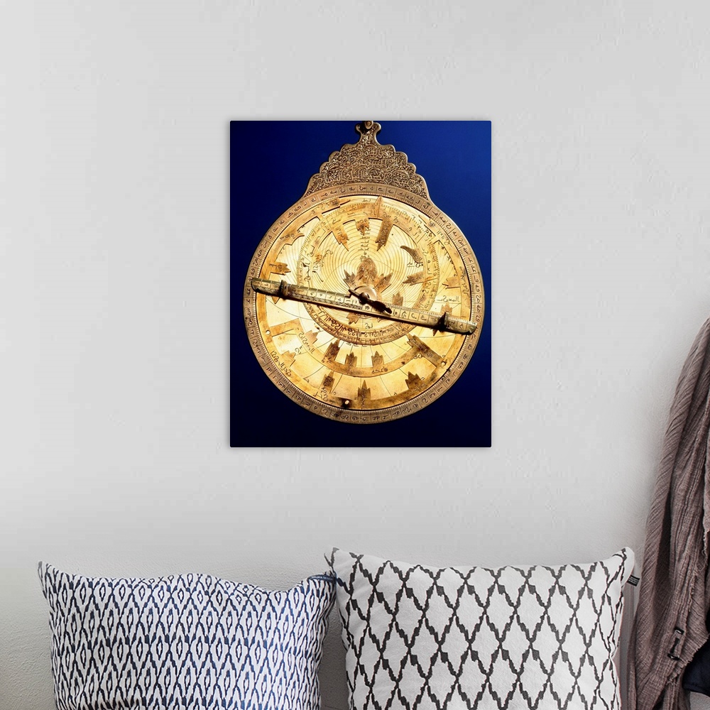 A bohemian room featuring Astrolabe. Brass astrolabe from the middle ages. The astrolabe consists of circles marked with an...