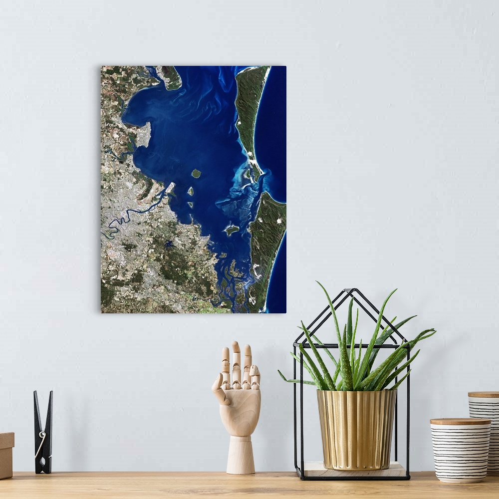 A bohemian room featuring Brisbane, Australia, satellite image. North is at top, water is blue, shallow coastal areas are l...