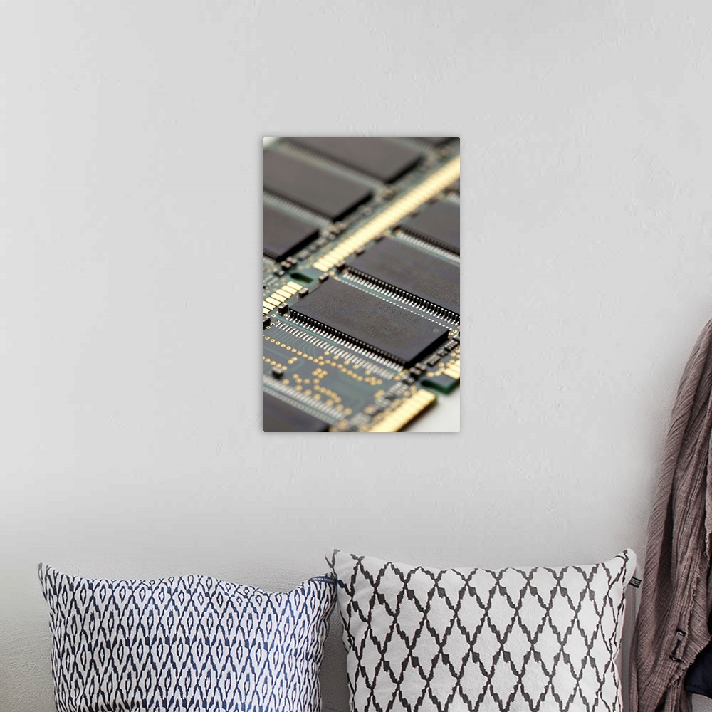 A bohemian room featuring Computer memory chips. RAM (random access memory) chips (grey) on two circuit boards from a compu...