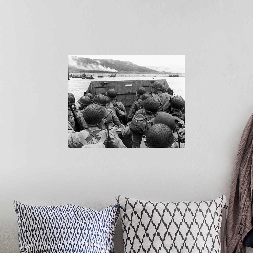 A bohemian room featuring D-Day landings. US assault troops in a landing craft behind its protective shield as it nears a b...