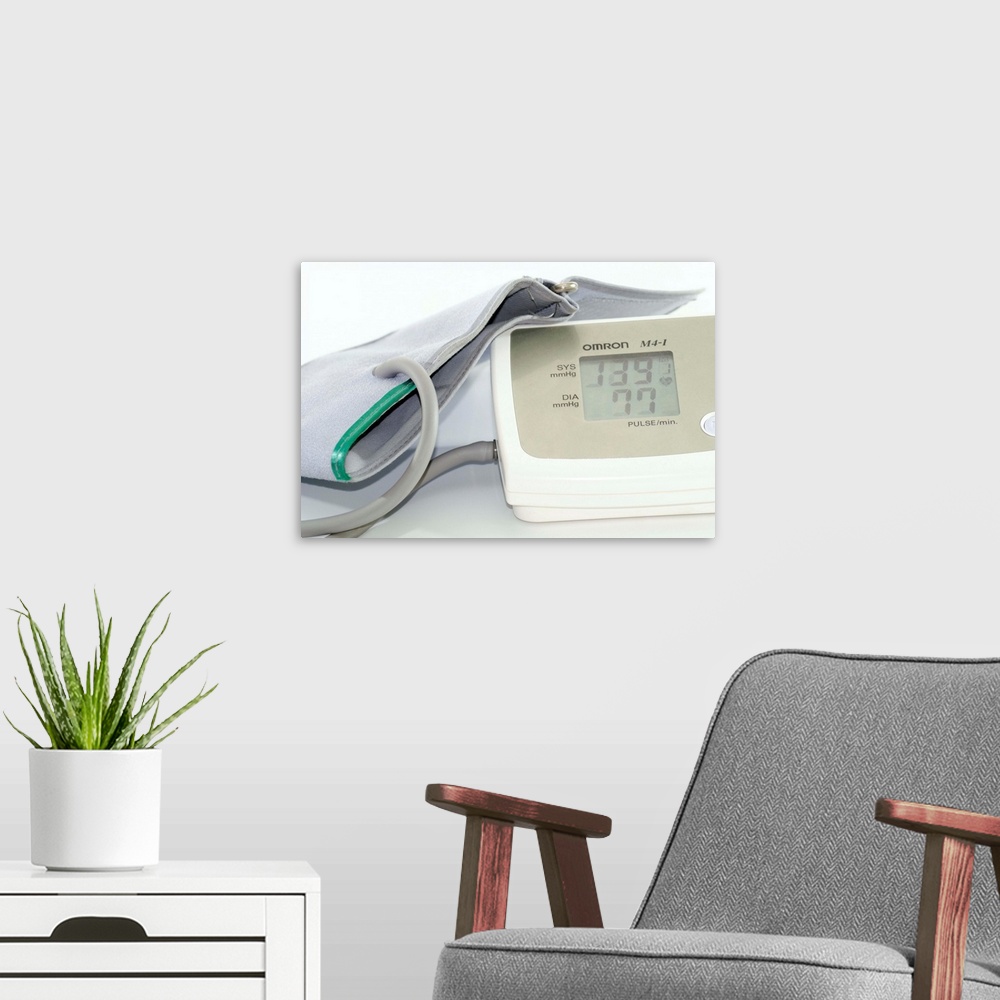 A modern room featuring Digital blood pressure monitor (sphygmomanometer). This device is used to measure a person's bloo...