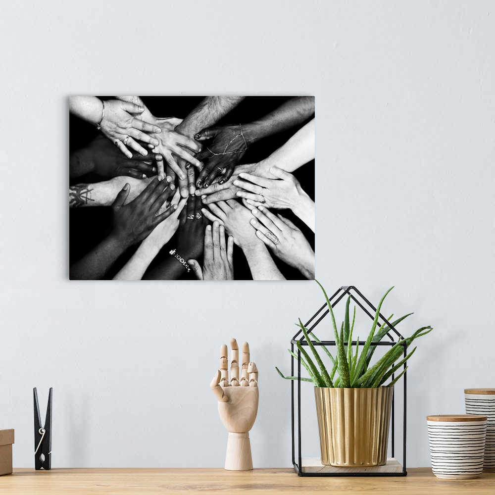 A bohemian room featuring Diversity and unity. Conceptual image of the hands of people of different ages, genders and ethni...