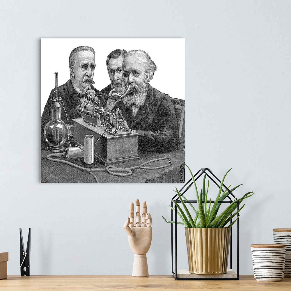 A bohemian room featuring Early telephone. Historical artwork of three men gathered around an early telephone. The man at r...