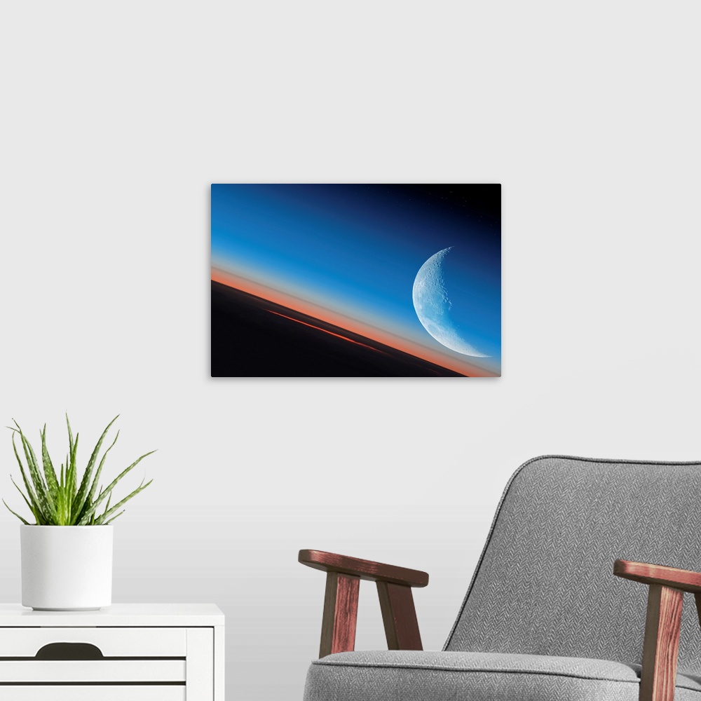 A modern room featuring Earth and Moon from orbit. Computer illustration looking across the Earth's outer atmosphere towa...