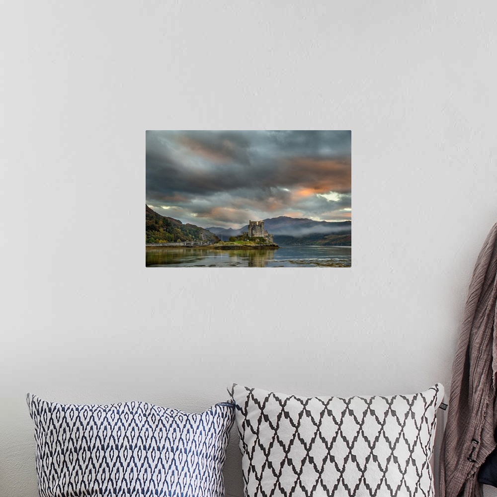 A bohemian room featuring Eilean Donan castle at dusk. This castle was built in the early thirteenth century. Photographed ...