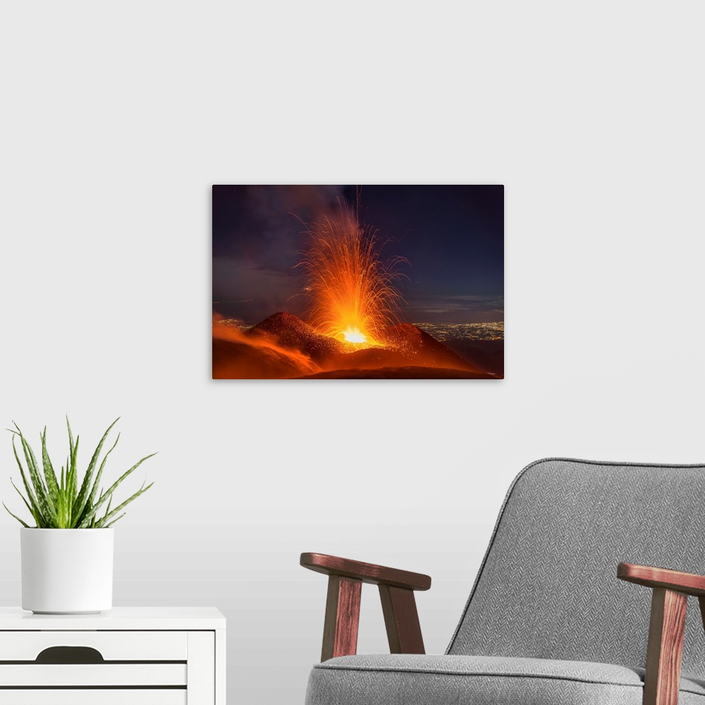 A modern room featuring Eruption of Mount Etna, November 2013. Mount Etna, on the Italian island of Sicily, reaches an el...