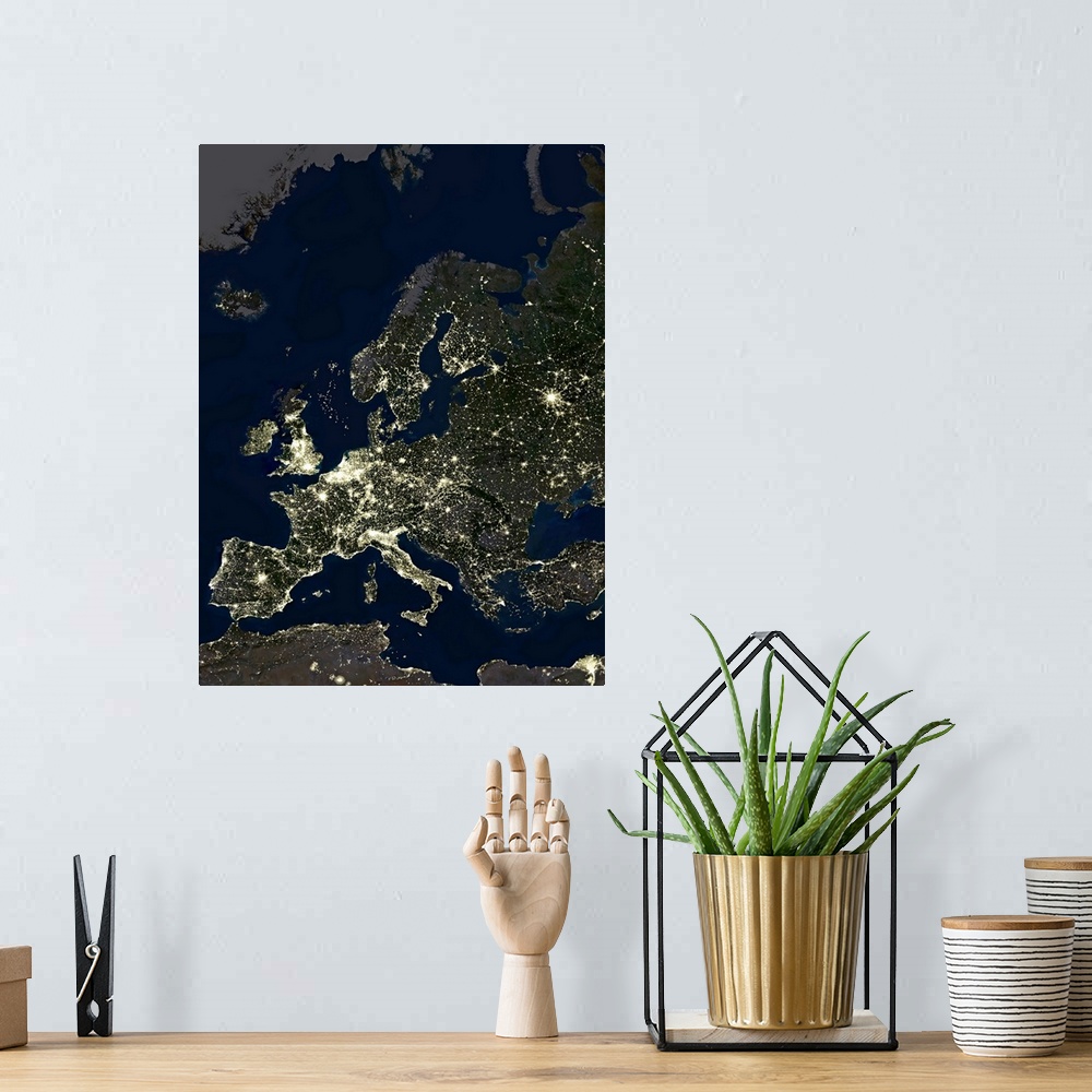 A bohemian room featuring Europe at night, satellite image. City lights (yellow) of increasing intensity show areas of incr...