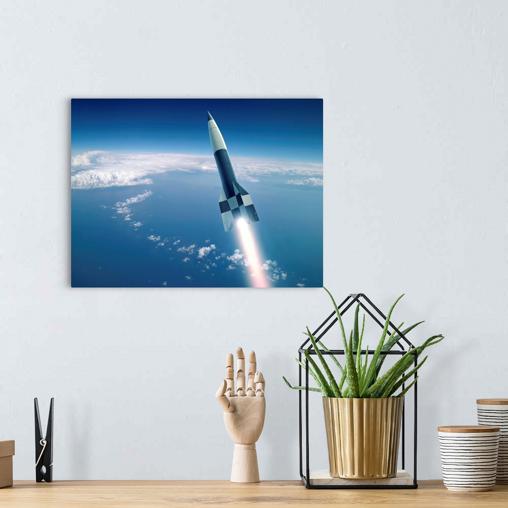 A bohemian room featuring First V-2 (A-4) rocket launch, artwork. Designed and built in Germany during World War II, this r...