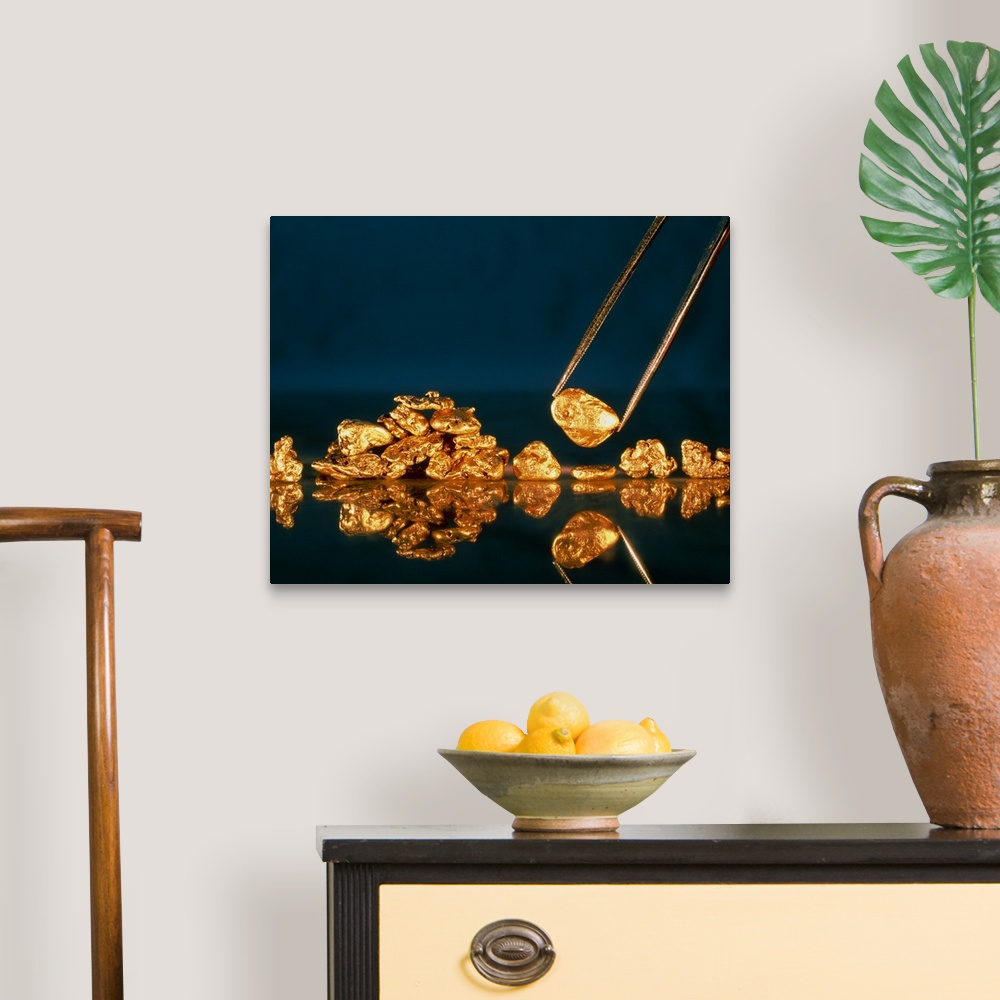 A traditional room featuring Gold. Nuggets made of gold. Gold is the 79th element of the periodic table, and has a relative at...