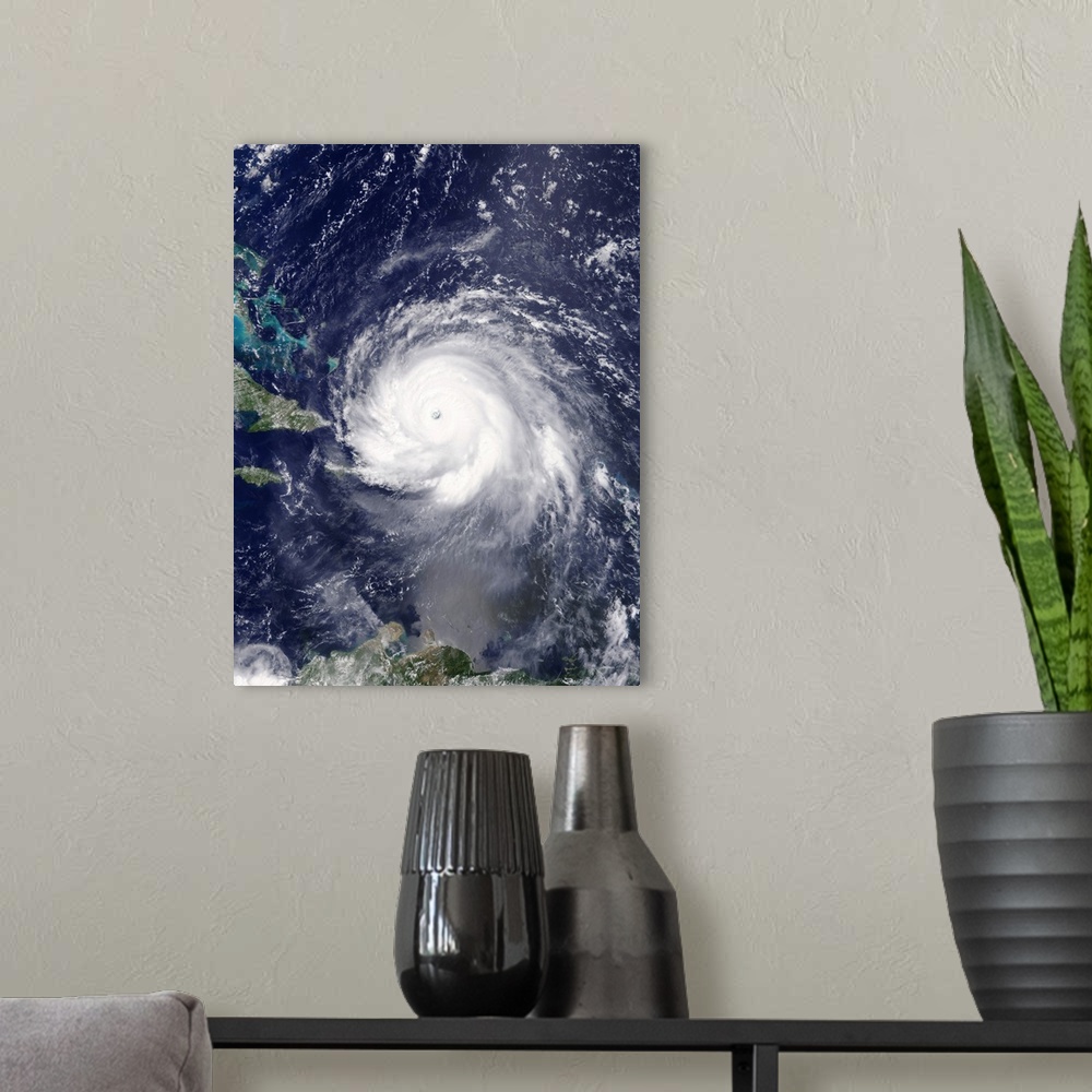 A modern room featuring Satellite image of Hurricane Irma over Hispaniola on the 7th September 2017. Irma made landfall o...