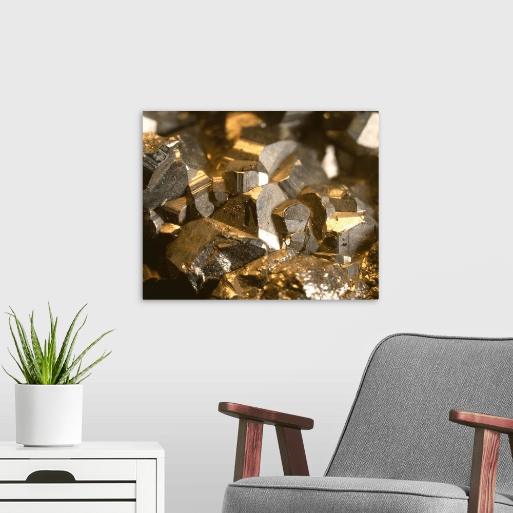 A modern room featuring Iron pyrites. Macrophotograph of crystals of iron pyrites, a crystalline form of iron sulphide (F...