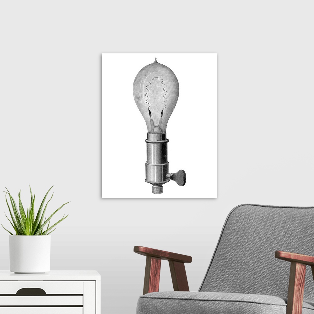 A modern room featuring Light bulb, historical artwork. This is an incandescent light bulb, using a metal filament throug...