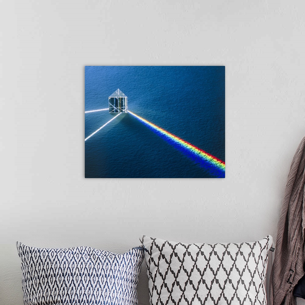 A bohemian room featuring A prism demonstrating refraction and reflection effects. A beam of white light strikes the prism,...