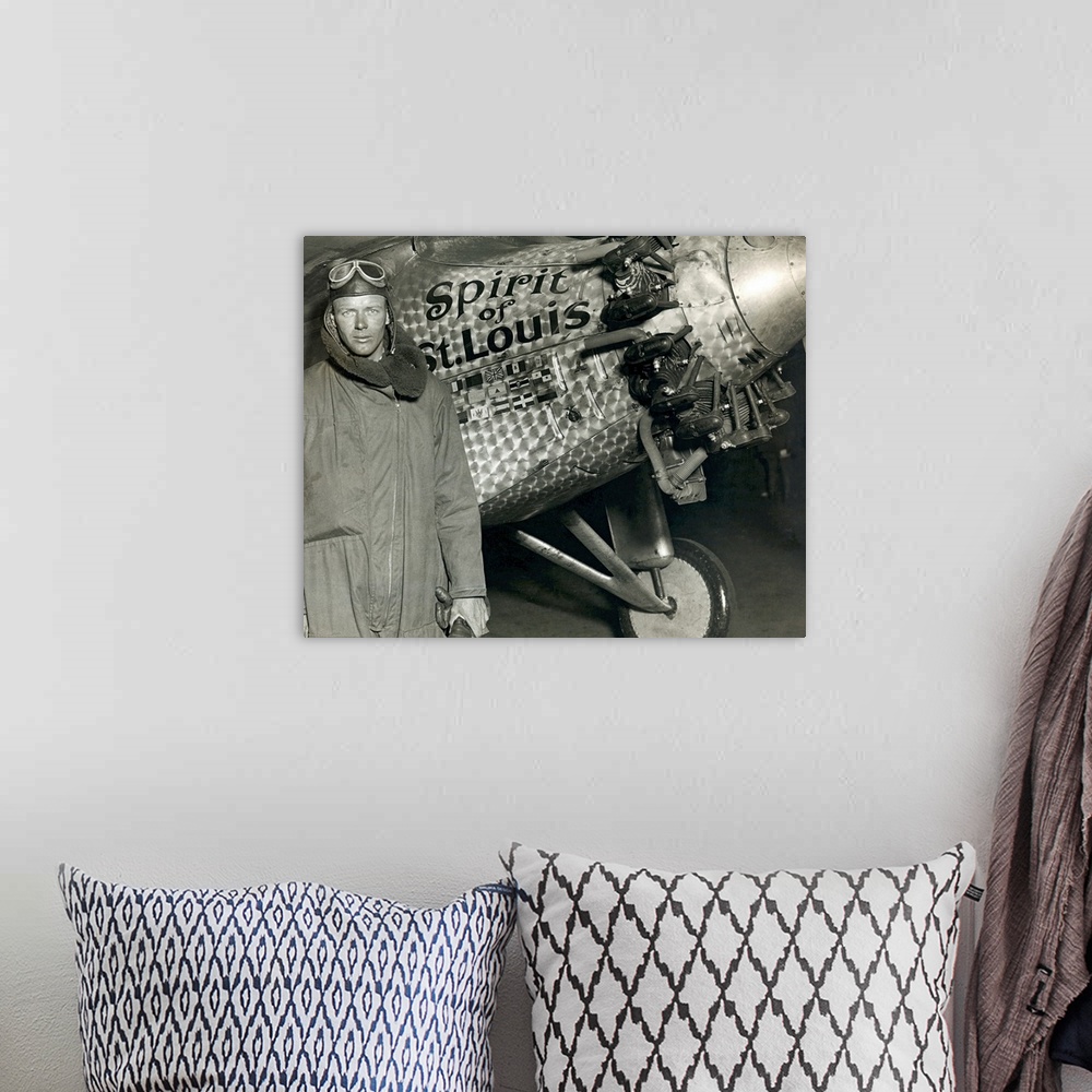 A bohemian room featuring Vintage photo on canvas of Lindbergh in front of the Spirit of St. Louis after the first transatl...