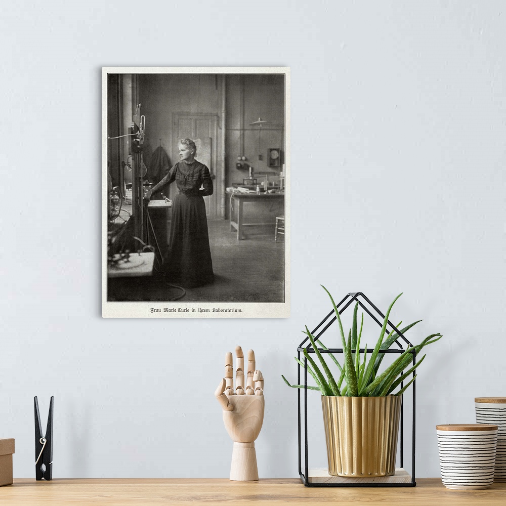 A bohemian room featuring Marie Curie (1867-1934, nee Marya Sklodowska), Polish-French physicist, in her laboratory. With h...