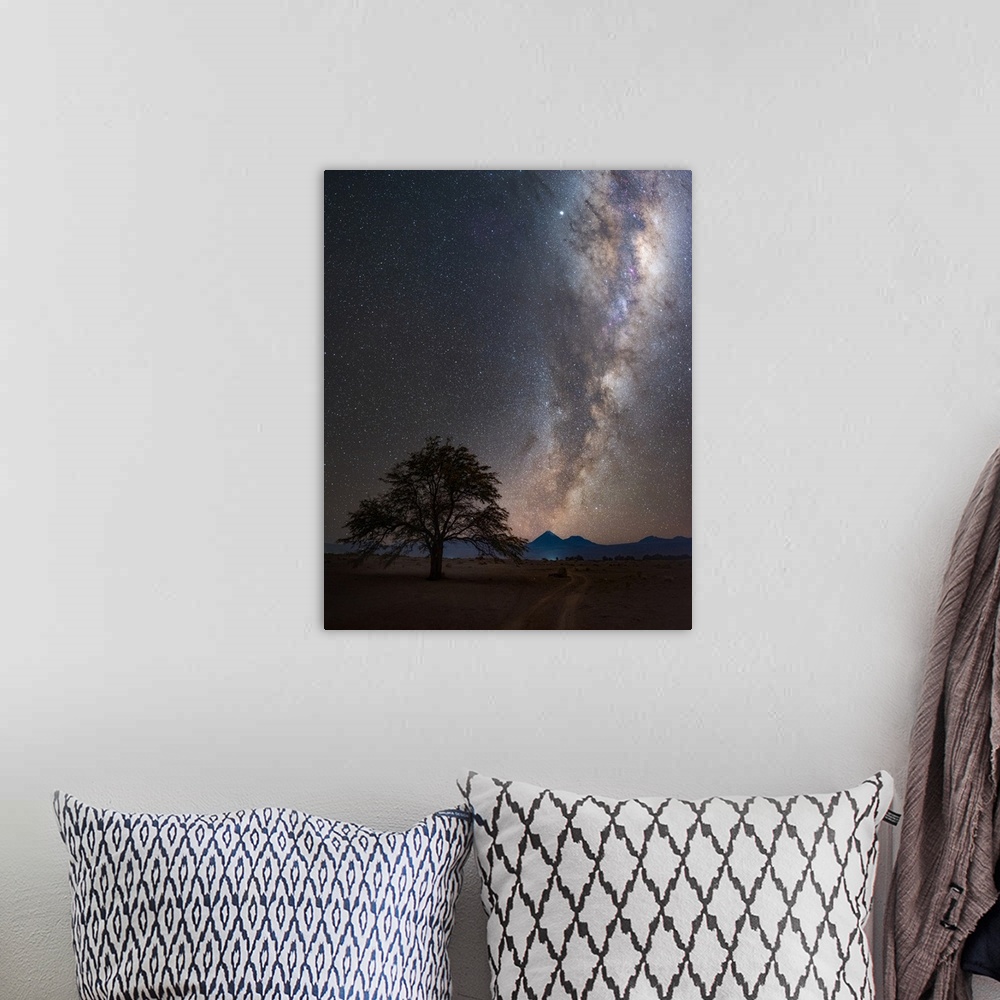 A bohemian room featuring Milky Way in the night sky over the desert village of San Pedro de Atacama, Chile. The galaxy is ...