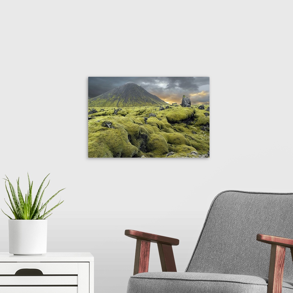 A modern room featuring Moss-covered lava field and volcanic cone, Iceland. The lava fields of southern Iceland are often...