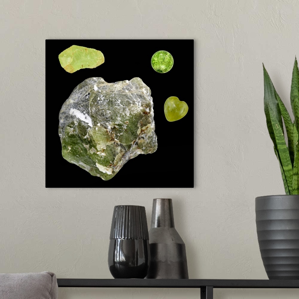 A modern room featuring Peridot. The specimens at top right and middle right are polished and the specimens at left are i...