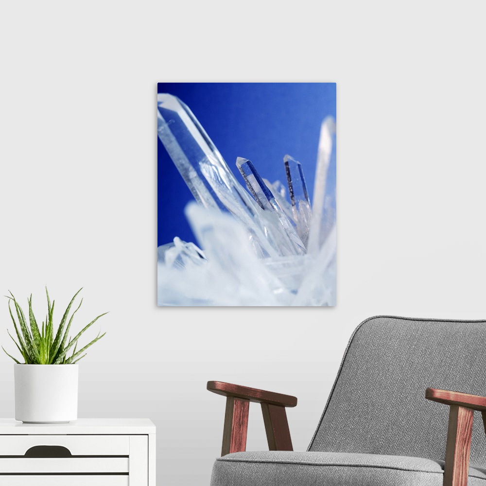 A modern room featuring Quartz crystals. Close-up of quartz or silicon dioxide (SiO2), one of the commonest minerals in t...